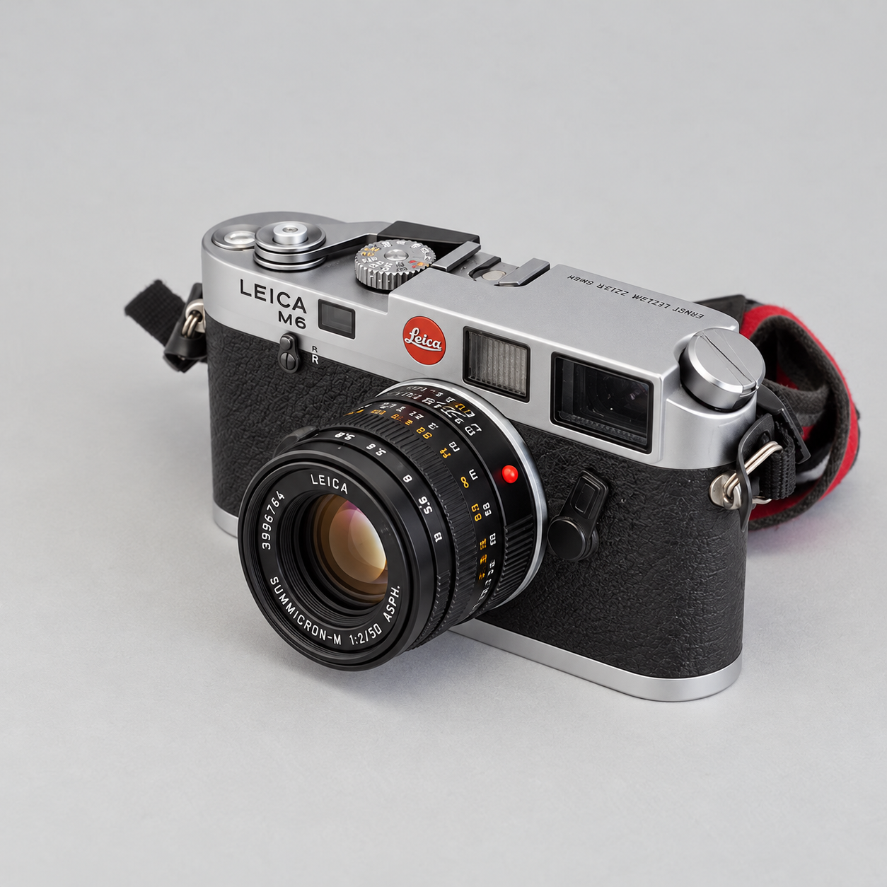 Silver and black Leica M6 camera in soft studio light, AI-generated illustrative image